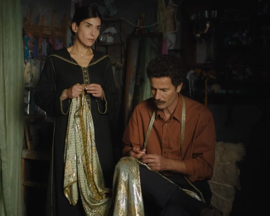 This image released by Strand Releasing shows Lubna Azabal, left, and Saleh Bakri in a scene from "The Blue Caftan" directed by Maryam Touzani.