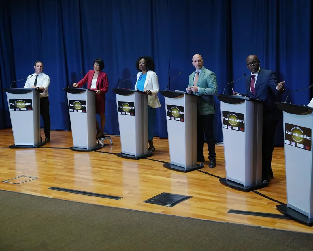 Toronto mayoral candidates Josh Matlow, left to right, Olivia Chow, Mitzie Hunter, Brad Bradford, Mark Saunders and Ana Bailao take the stage at a mayoral debate in Scarborough, Ont. on Wednesday, May 24, 2023. Advance voting in Toronto's mayoral contest has opened, inaugurating the final stretch of the campaign with just over two weeks left before election day.