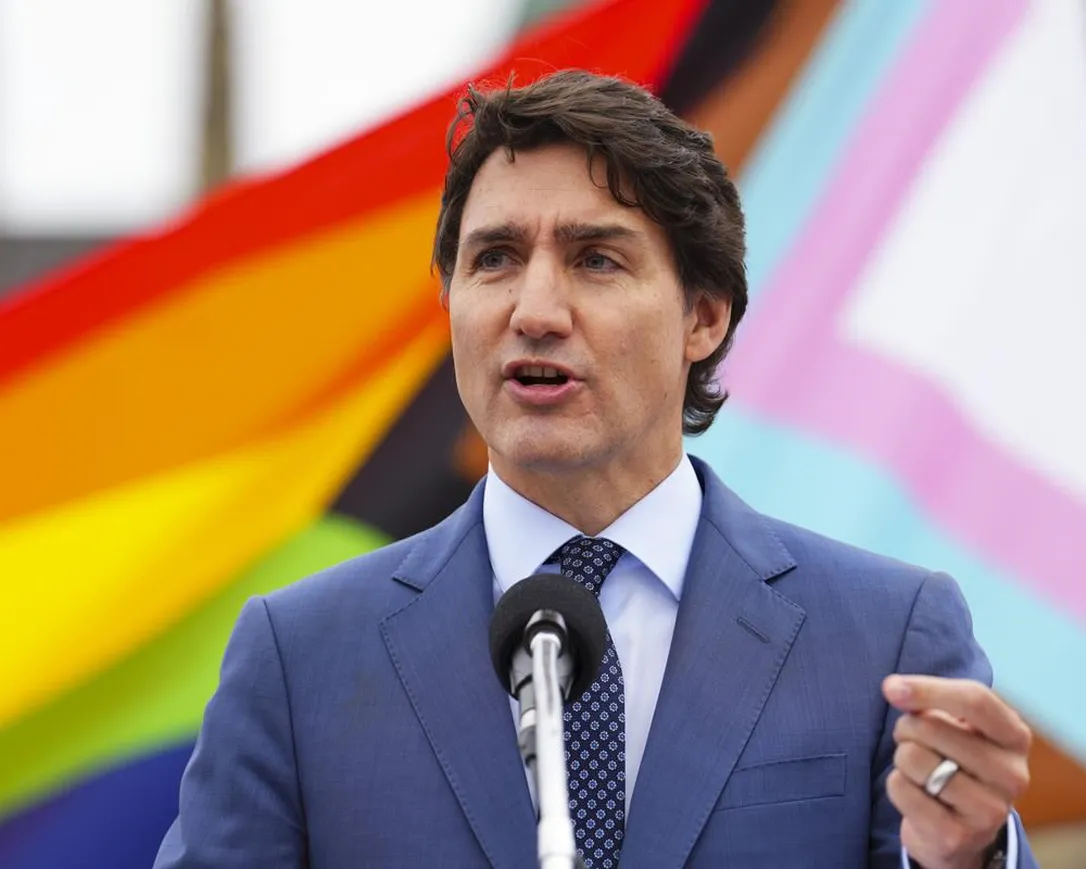 Prime Minister Justin Trudeau takes part in a Pride flag raising event on Parliament Hill in Ottawa on Thursday, June 8, 2023.&nbsp;Prime Minister Justin Trudeau says children who do not see a Pride flag raised at their schools should know one is flying for them on Parliament Hill.