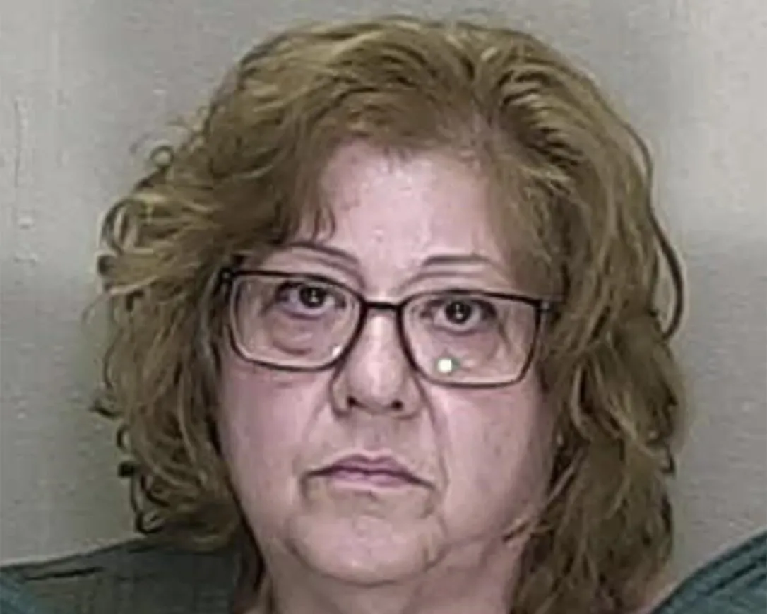 This booking image provided by the Marion County, Fla., Sheriff’s Office shows Susan Louise Lorincz, 58, charged with shooting and killing her Black neighbor. Lorincz, who made her initial appearance in court by video, Thursday, June 8, 2023, has been charged with the first-degree felony of manslaughter with a firearm, as well as culpable negligence, battery and two counts of assault.