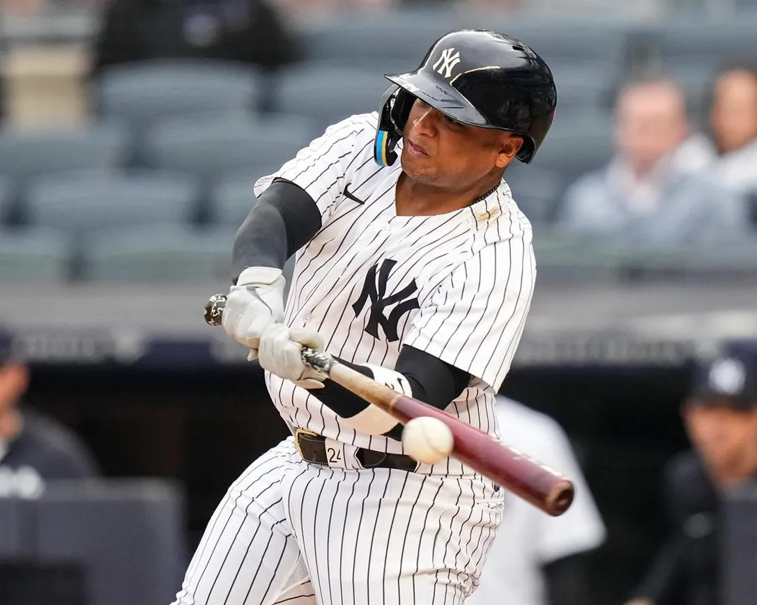 New York Yankees' Willie Calhoun hits an RBI-single during the second inning in the first baseball game of a doubleheader against the Chicago White Sox, Thursday, June 8, 2023, in New York.