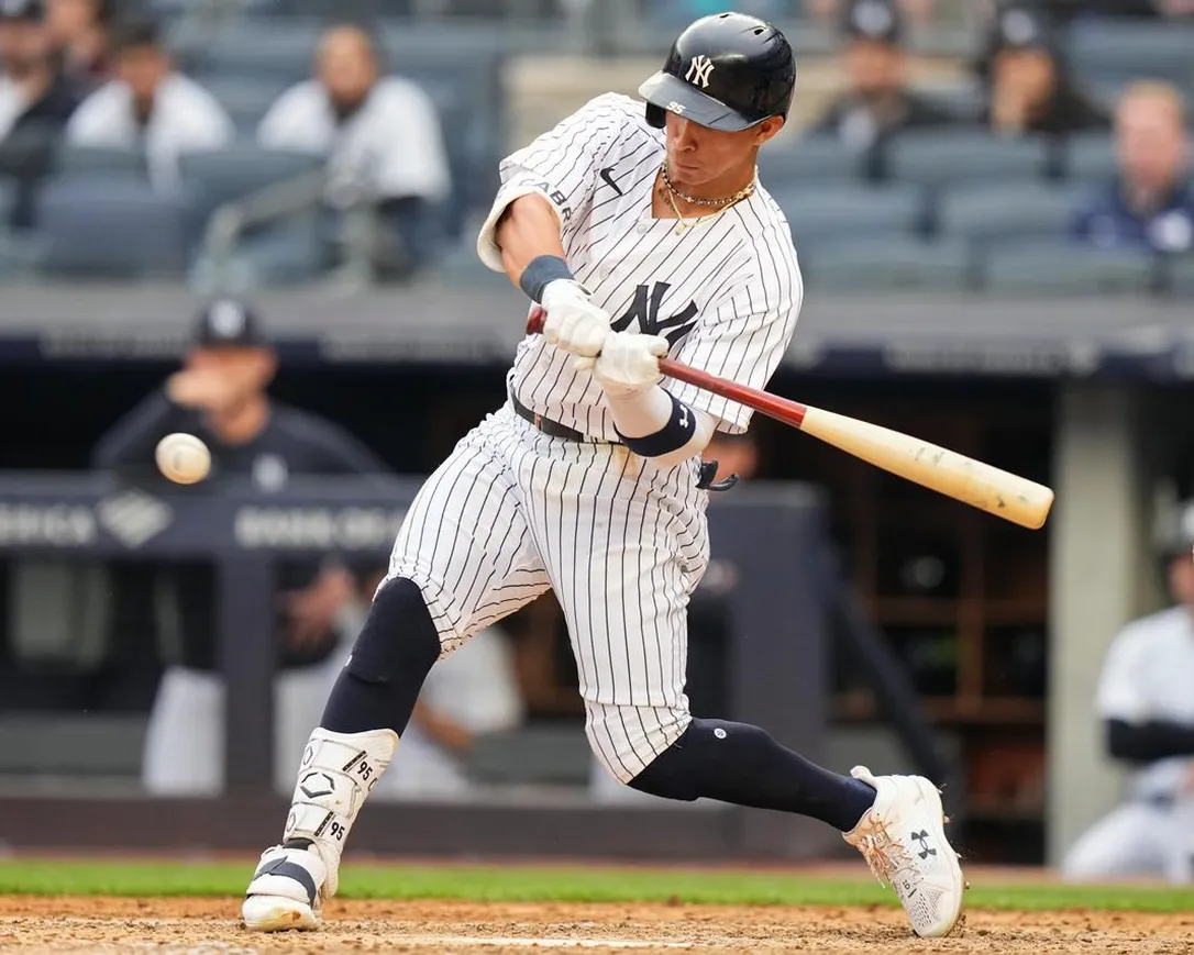 New York Yankees' Oswaldo Cabrera hits an RBI-single during the fifth inning in the first baseball game of a doubleheader against the Chicago White Sox, Thursday, June 8, 2023, in New York.