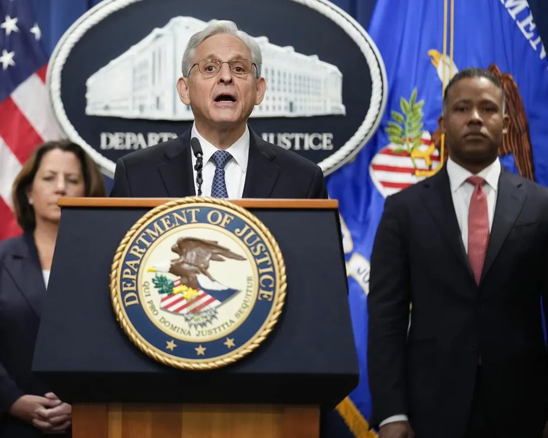 Attorney General Merrick Garland announces a special counsel to oversee the Justice Department's investigation into the presence of classified documents at former President Donald Trump's Florida estate and aspects of a separate probe involving the Jan. 6 insurrection and efforts to undo the 2020 election, at the Justice Department in Washington, Nov. 18, 2022. At left is Deputy Attorney General Lisa Monaco and Assistant Attorney General for the Criminal Division Kenneth Polite.