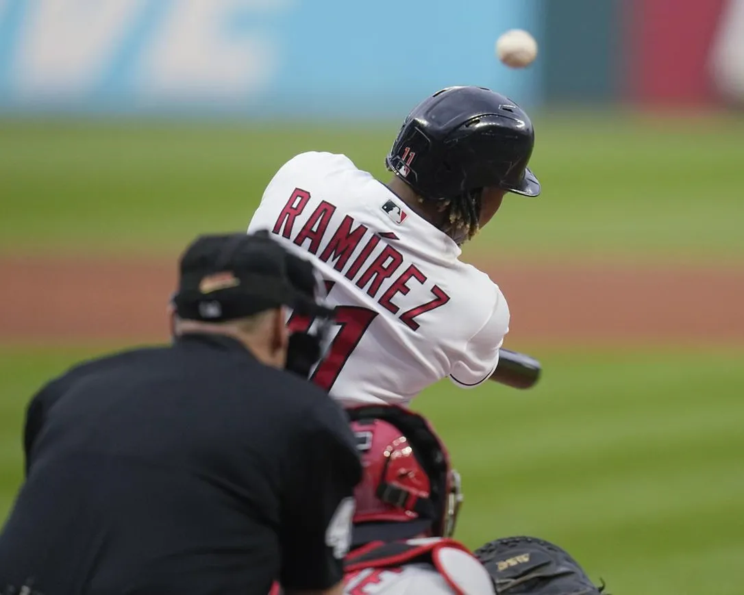 Cleveland Guardians' Jose Ramirez hits a home run against the Boston Red Sox during the first inning of a baseball game Thursday, June 8, 2023, in Cleveland.