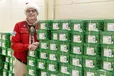 Longtime Santa Claus Fund coordinator Don Ford poses with some remaining gift boxes on Dec. 16, 2022. 