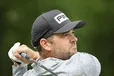 Corey Conners birdied five holes while grabbing a share of the first-round lead at the RBC Canadian Open on Thursday.